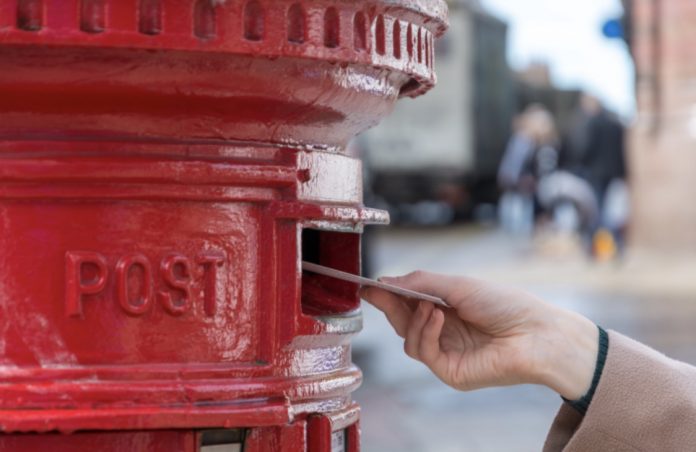 Royal Mail letter being posted